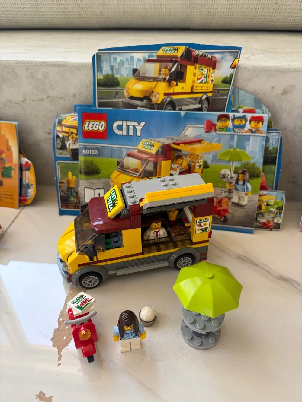4 Lego Sets - Camper, Ice Cream Truck, Pizza Truck, Donut Stand